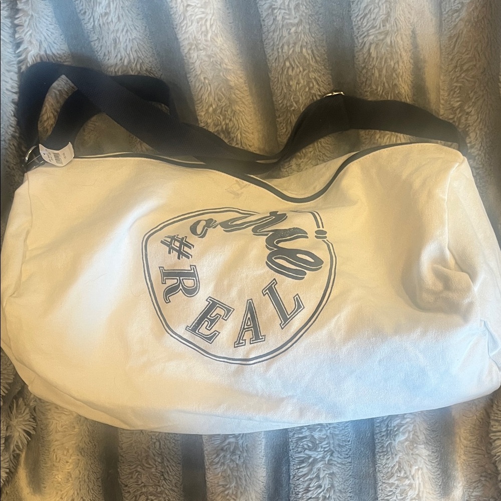 Aerie Cream Travel Bag with Navy Accents